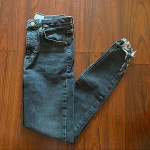 Distressed black jeans